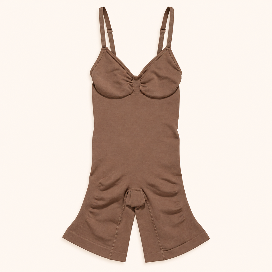 Brown seamless body shaper with adjustable straps on a cream background